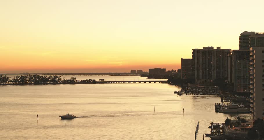 A view of a waterway near some buildings at a city