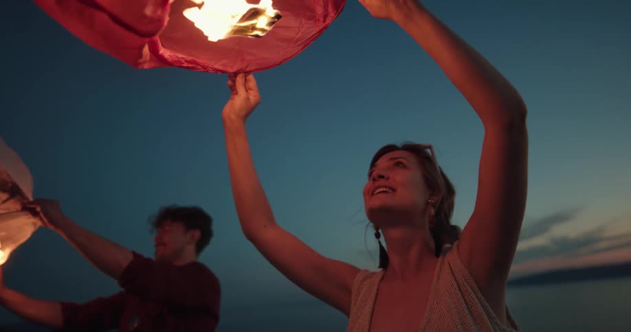 Man and woman are outdoors together at dusk