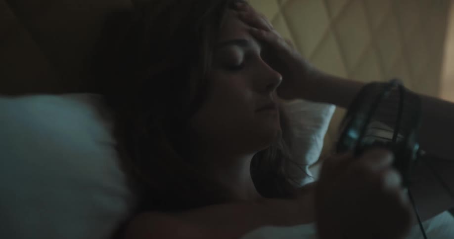 Woman lying in bed