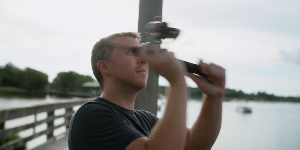 A man casts his line in to the water