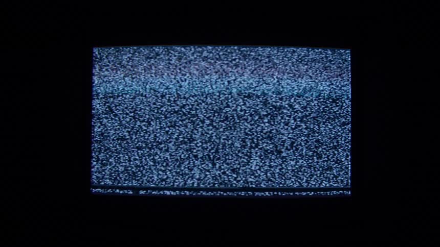 A television screen is displayed in a room