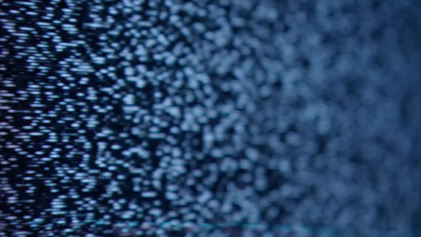 Black white and gray colors that look like a tv screen with static