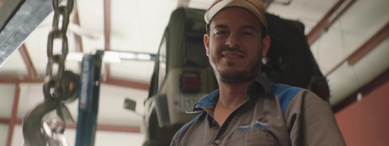 Mechanic smiling