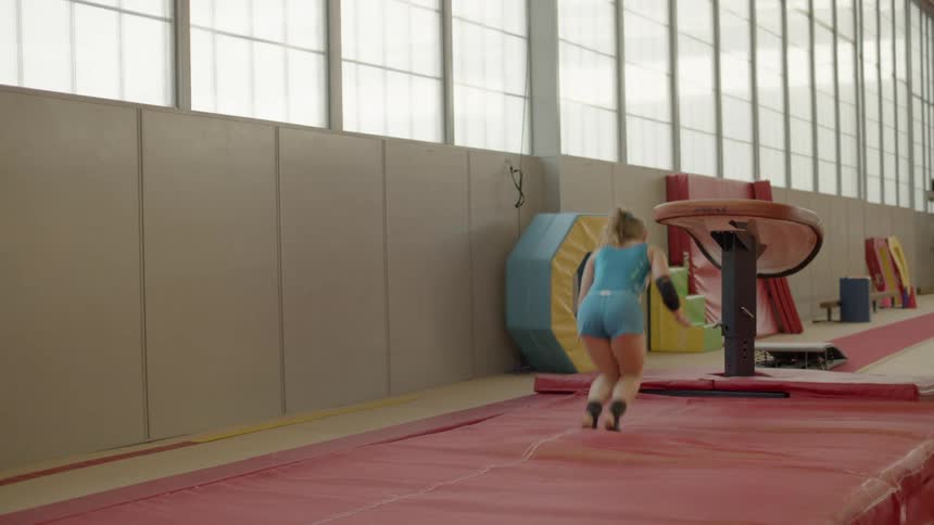 Woman practicing gymnastics