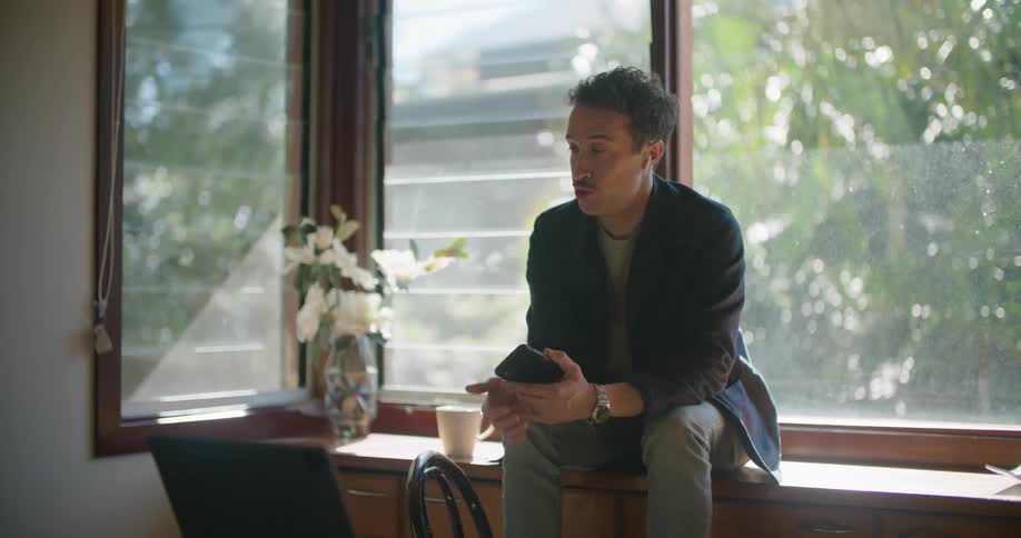 Man sitting and talking