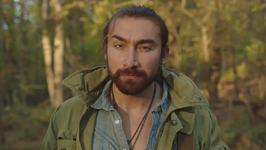 Man in forest posing