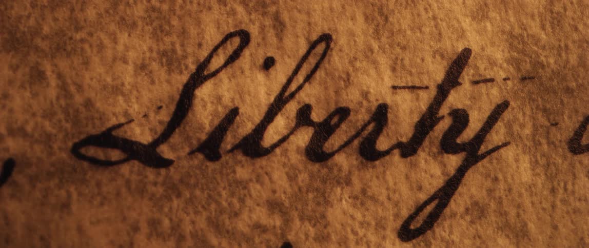 A view of the word liberty written in calligraphy