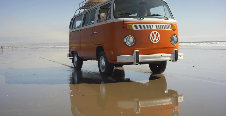 A van drives on the beach