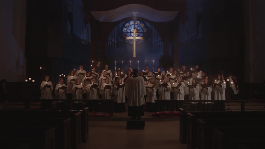 A choir is performing in a church