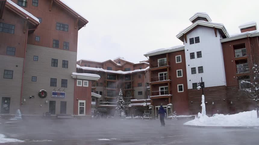 People walking in a snowy parking lot