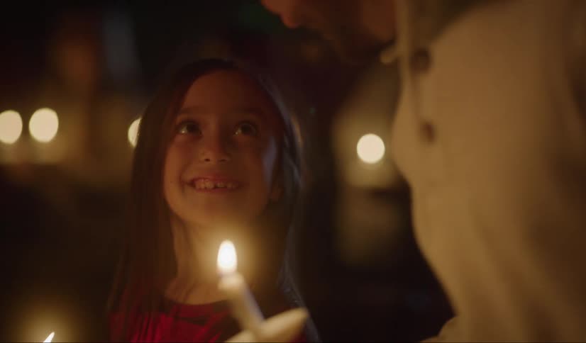 People holding candles