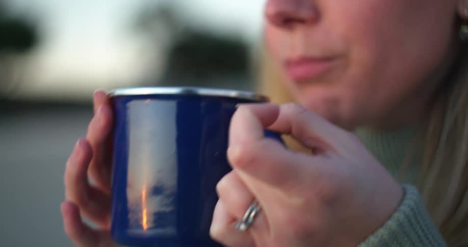 Woman drinking from mug