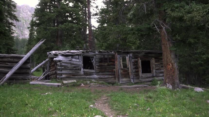 A run-down old cabin in the woods