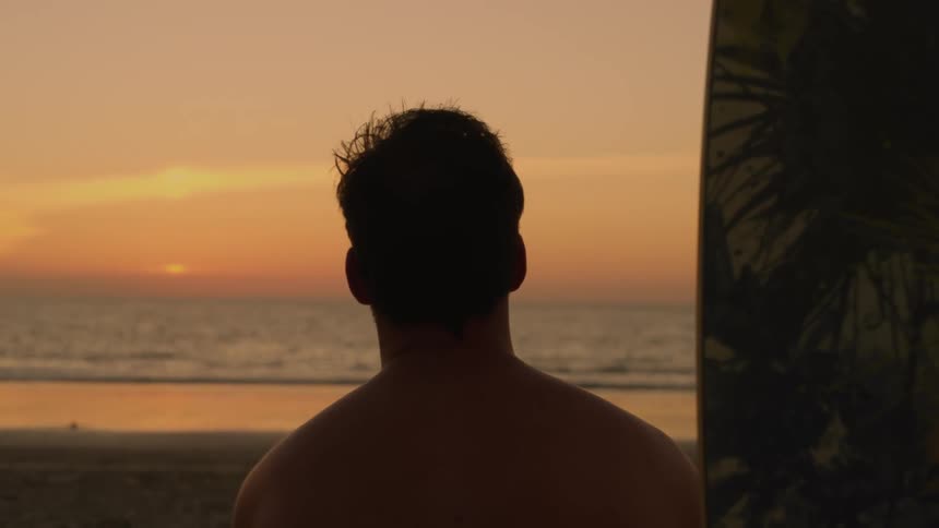 Person sitting at beach