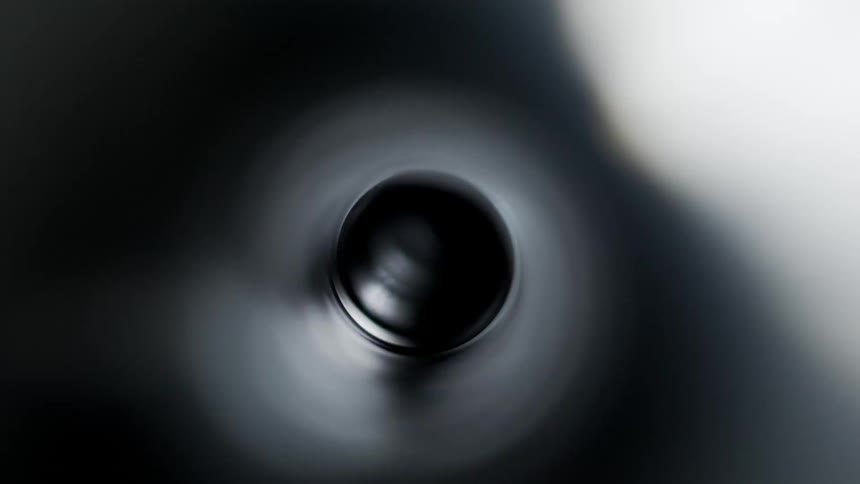 A view of a bubble floating in water