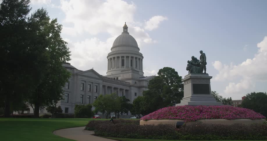 A view of a statue and building outdoors
