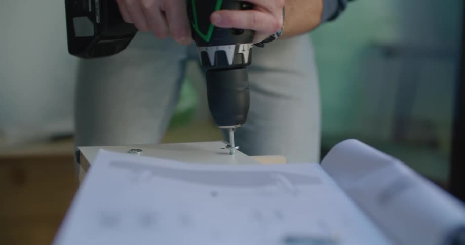 Man drilling wood