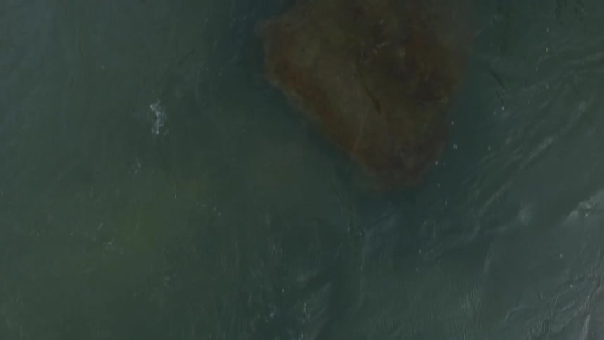 Water flowing over rocks in a river
