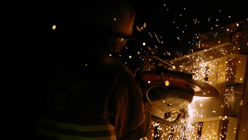 Person welding metal