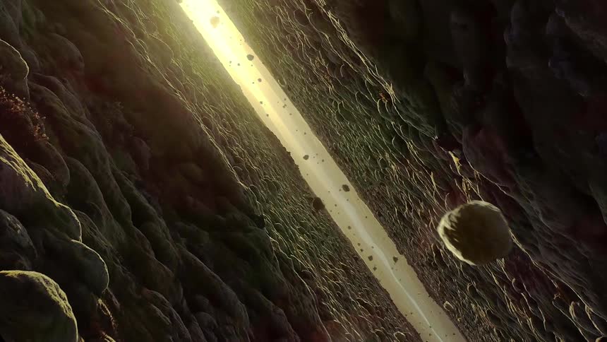 Loose boulders float in a narrow space between rocky surfaces