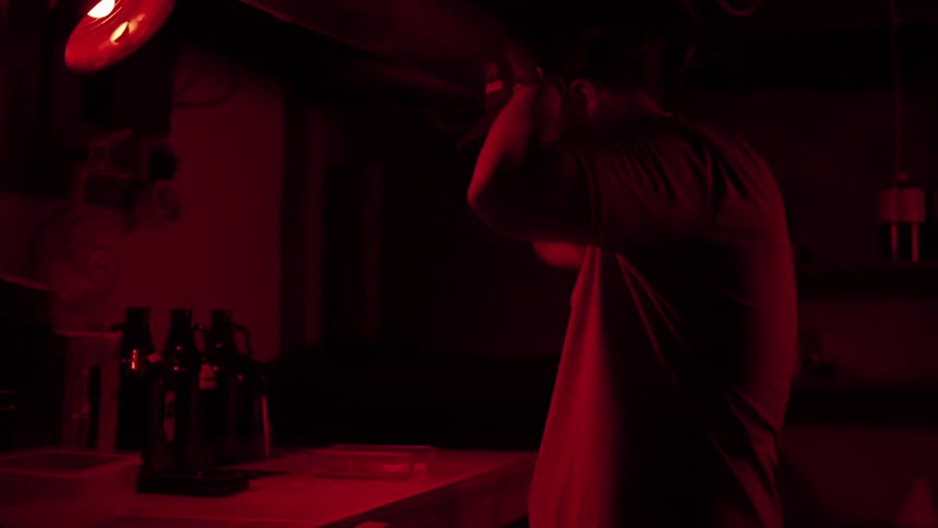 A man in a dark room