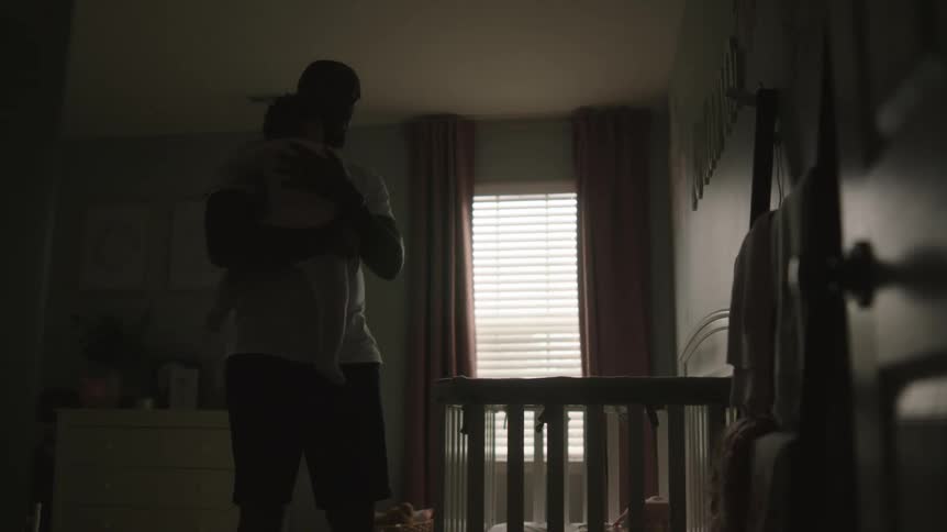 Father holding child
