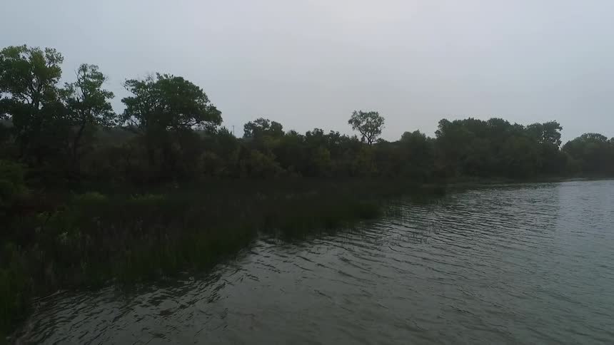 Moving over a field towards a lake