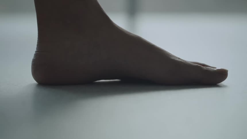 A bare foot on a floor