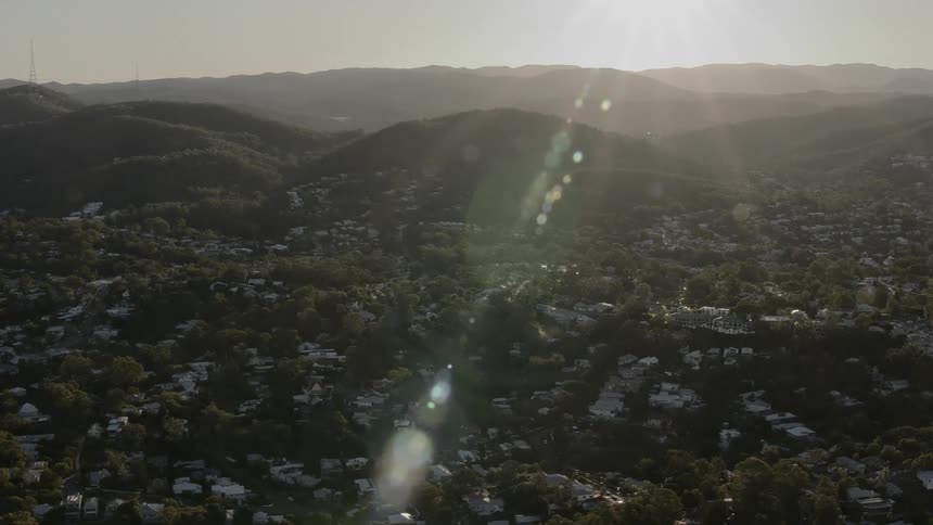 The town sits near the hills on a sunny day