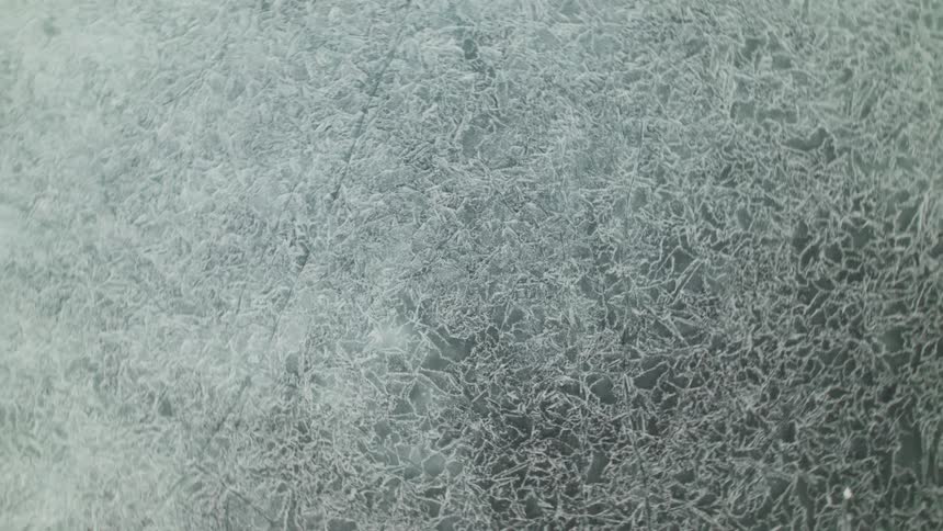 Tiny lines and cracks on the surface ice