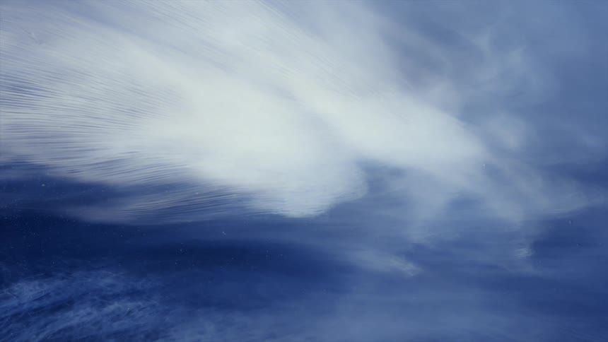 A view of clouds floating overhead