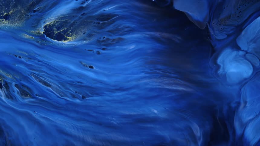 Yellow black and blue colors that look like paint and water