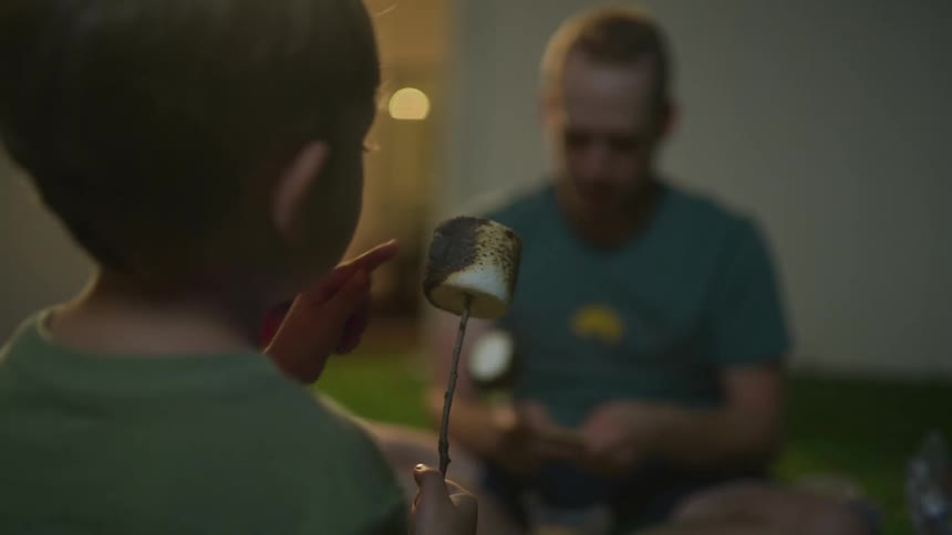 Man playing a game with child