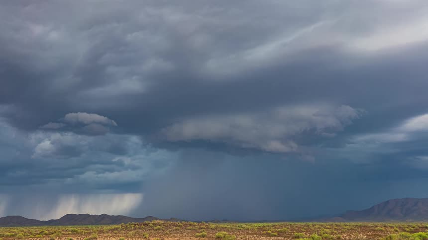 A view of a storm forming over some plains