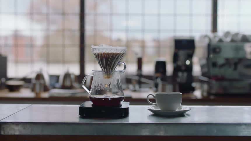 Coffee brewing on the counter top of a restaurant