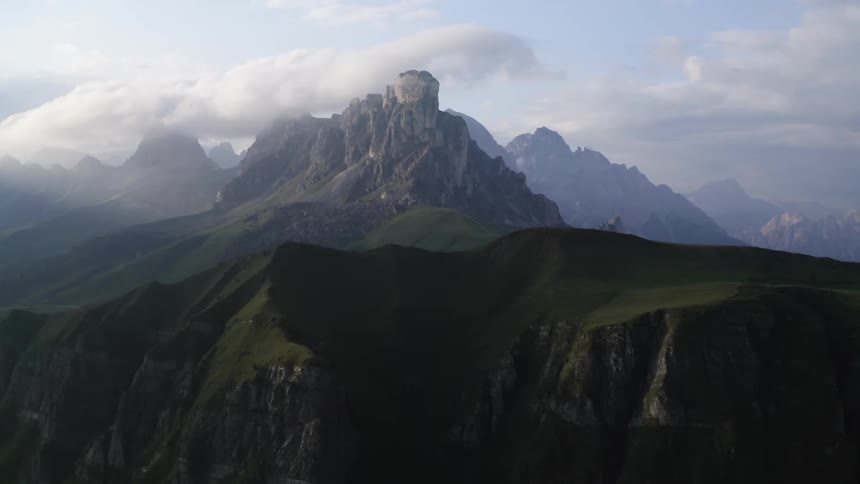Mountain peaks high in the clouds