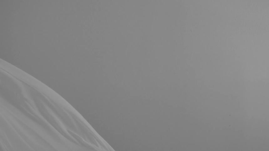 A white cloth is waving around