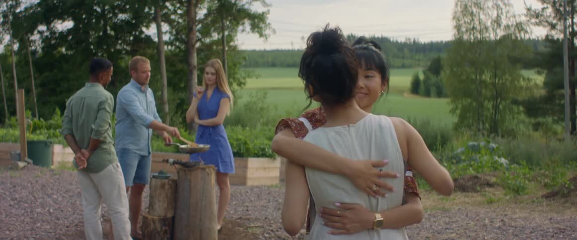 People gathering and hugging
