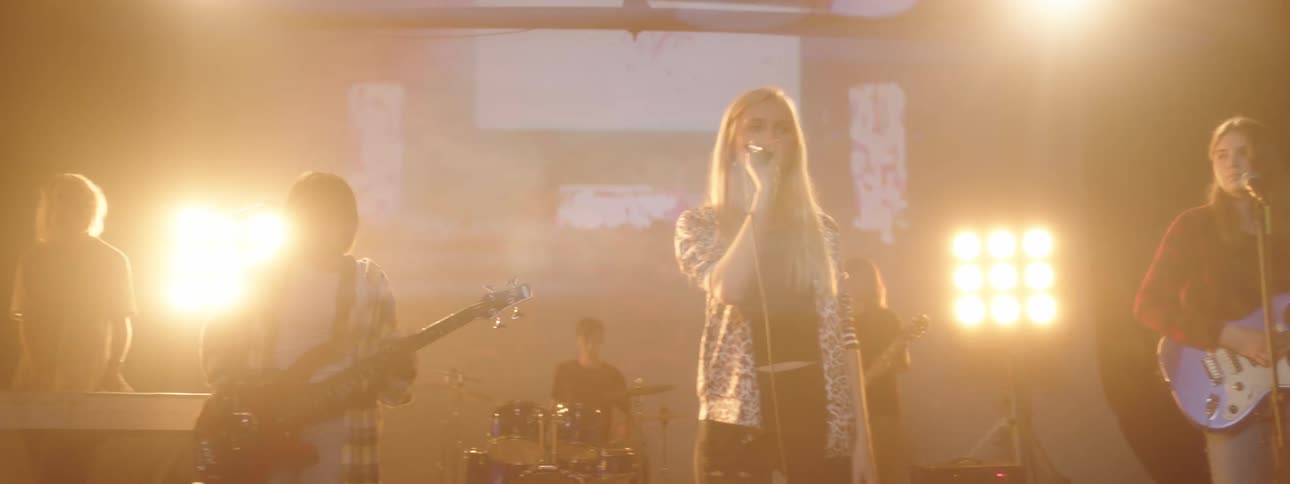 A band playing on a stage