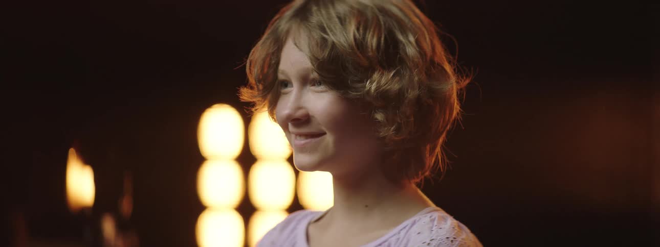 A teenager on a stage