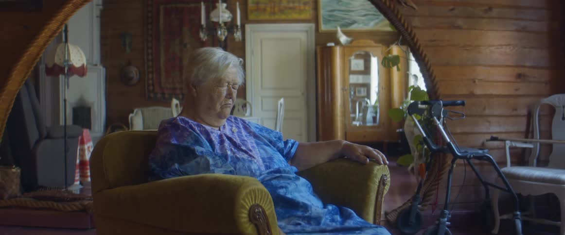 Elderly lady in chair