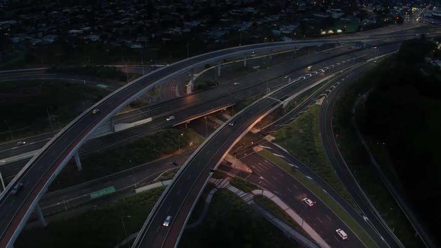 Traffic flows along multi level highway system
