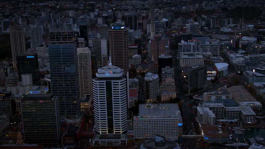 Heavy traffic passes through a dense city