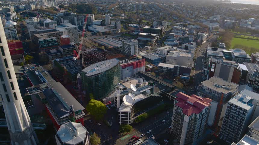 Aerial view of the buildings in the city downtown at sunset