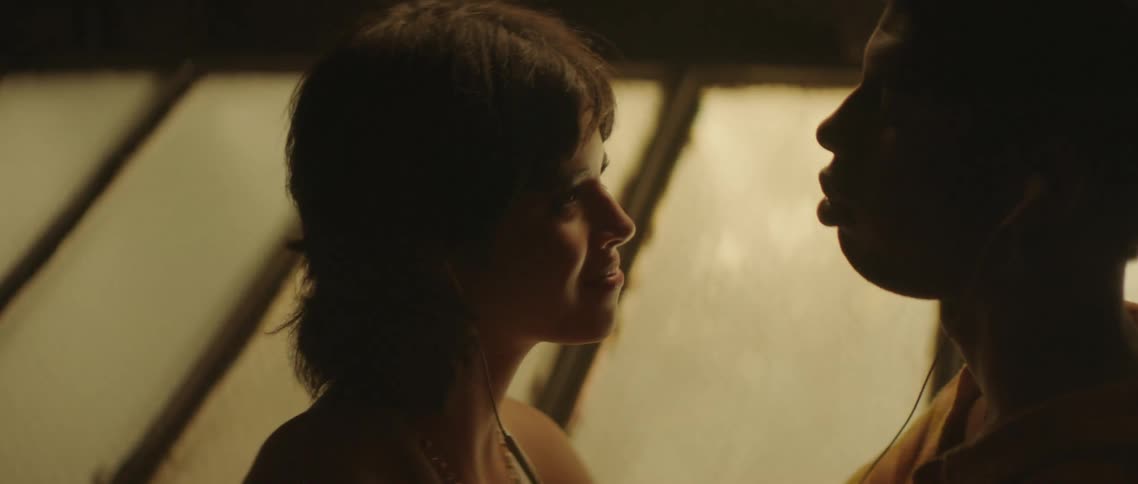 A man and a woman in a rooftop