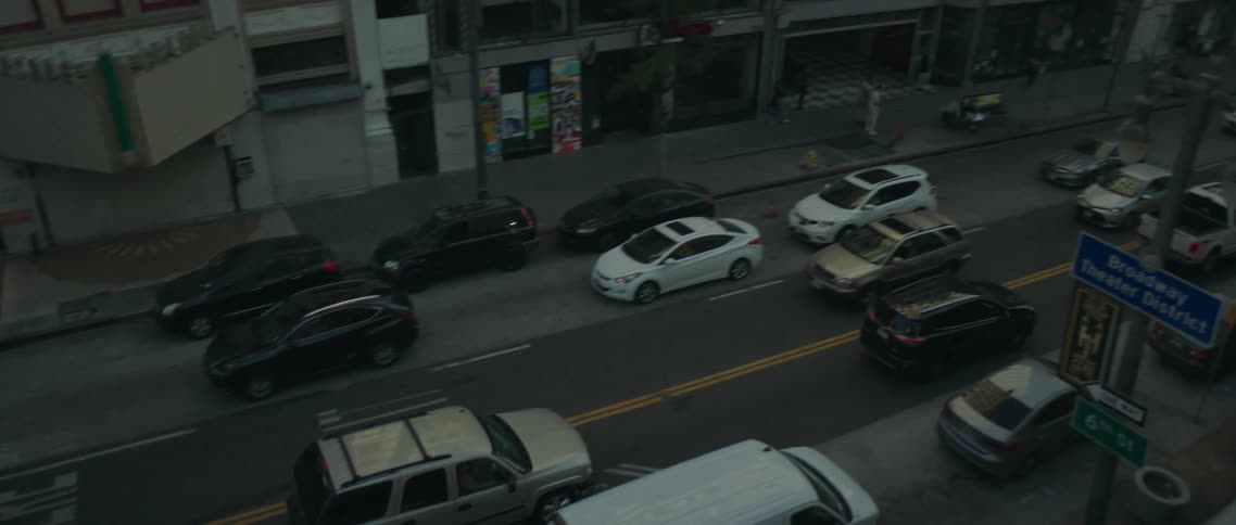A panning shot of a downtown street