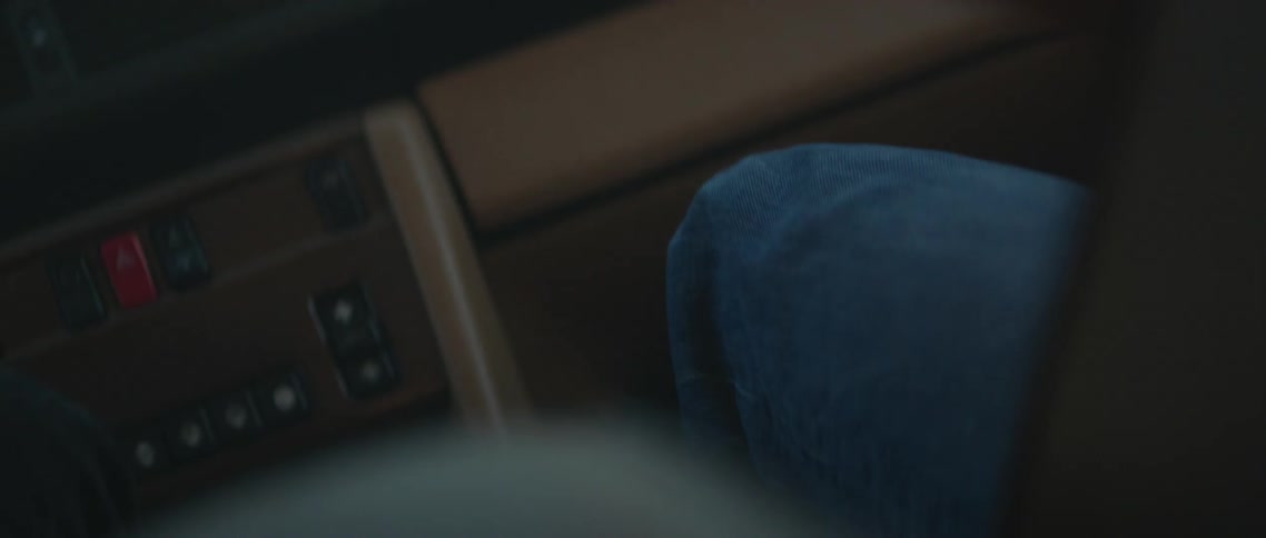 A woman riding in a car