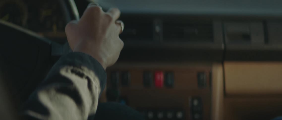 Two people ride in a car together