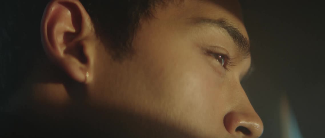 A man blinks while in the vehicle