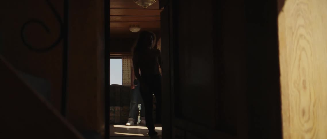 Teenagers walk down the hall in the home